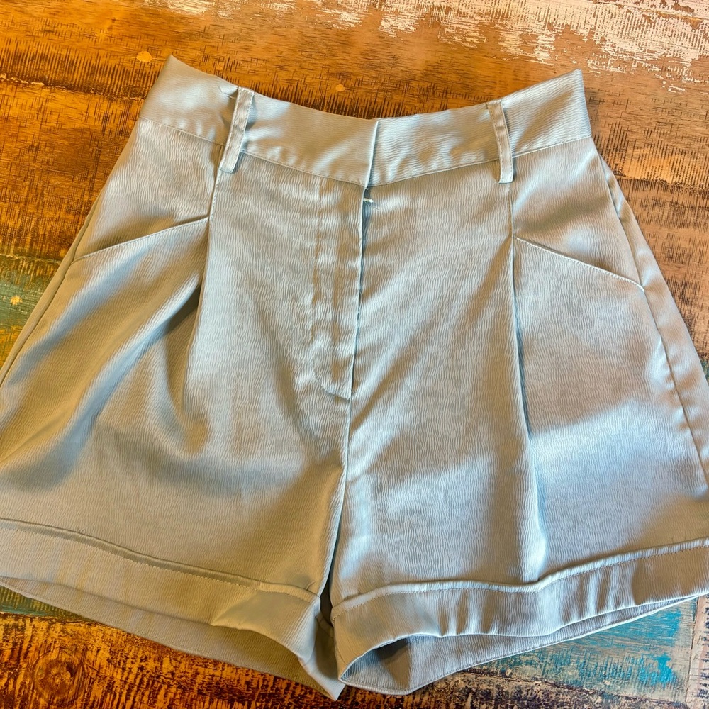 Sea green Shorts size small flat front with belt loops